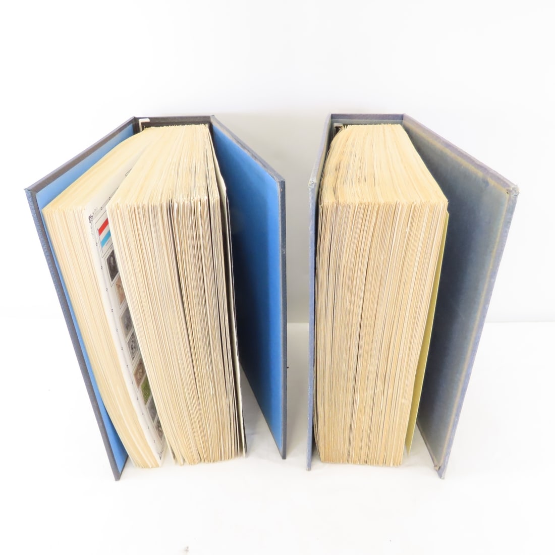2 Volume "The Regent World Stamp Album": 2 Volume "The Regent World Stamp Album" - Hinge Mounted Stamps from many countries. LOT SIZE: 13x10x6", 16 LBS All information and photos are intended to be as accurate as possible, but errors are