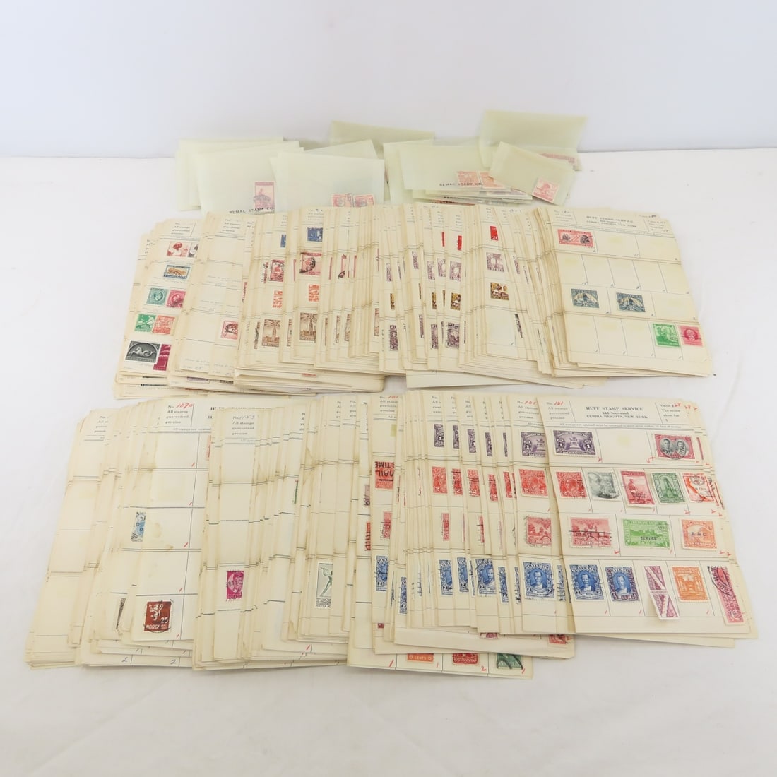 Worldwide Stamps on Approval Sheets & Glassine: Worldwide Stamps on Approval Sheets & Glassine - LOT SIZE: 14x8x6", 4 LBS All information and photos are intended to be as accurate as possible, but errors are possible. No item may be returned or