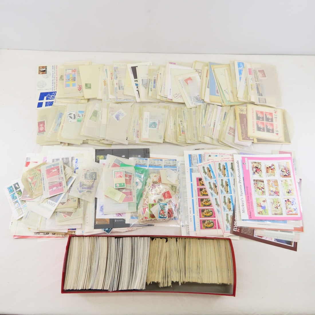 Collection of World Stamps in Glassine Envelopes: Collection of World Stamps in Glassine Envelopes - LOT SIZE: 15x15x7", 9 LBS All information and photos are intended to be as accurate as possible, but errors are possible. No item may be returned or 