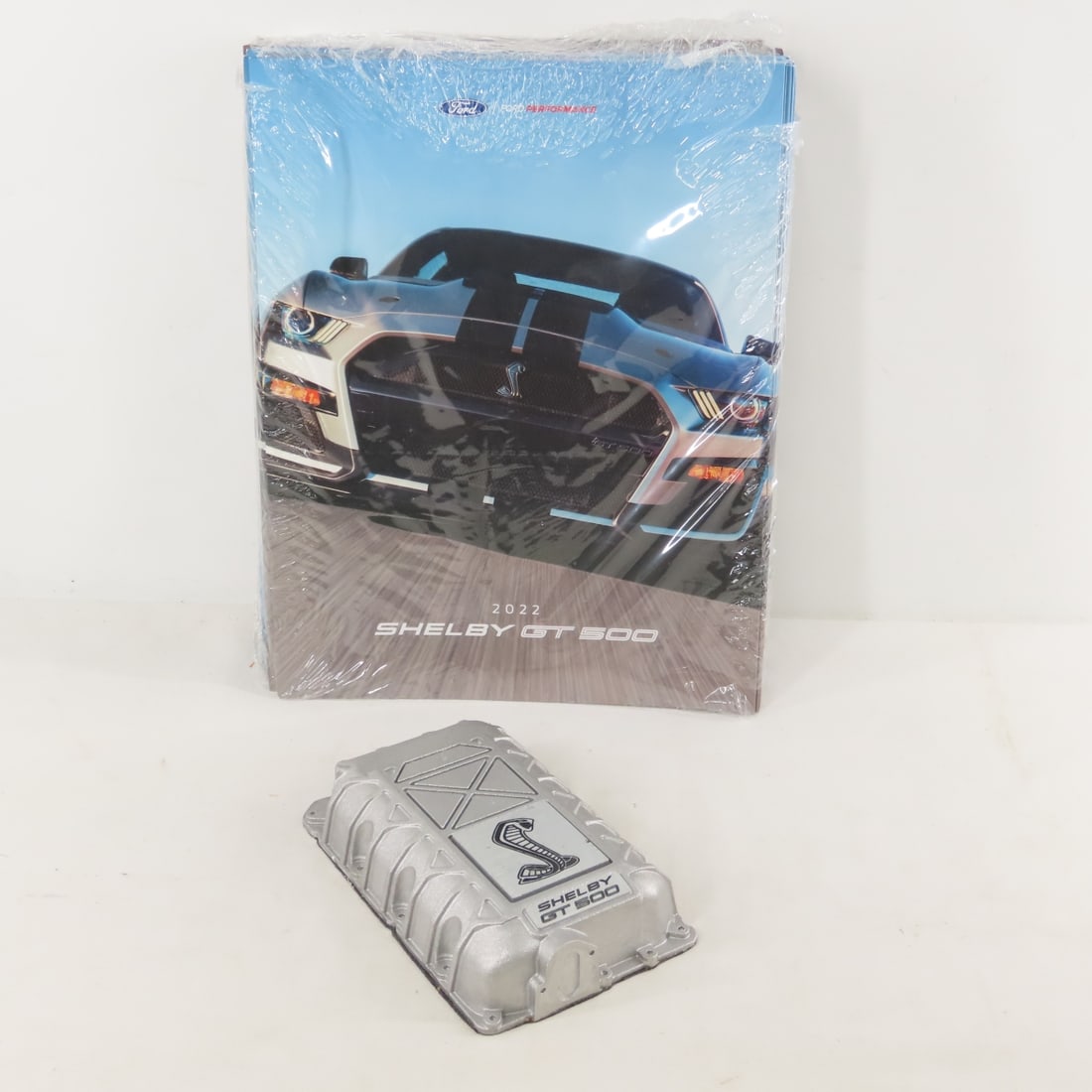 50 Shelby GT 500 2022 Brochures & Paperweight: 50 Shelby GT 500 2022 Brochures & Paperweight - dealer brochures in mostly sealed bundle & metal paper weight. LOT SIZE: 12x9x4", 8.5 LBS All information and photos are intended to be as accurate as
