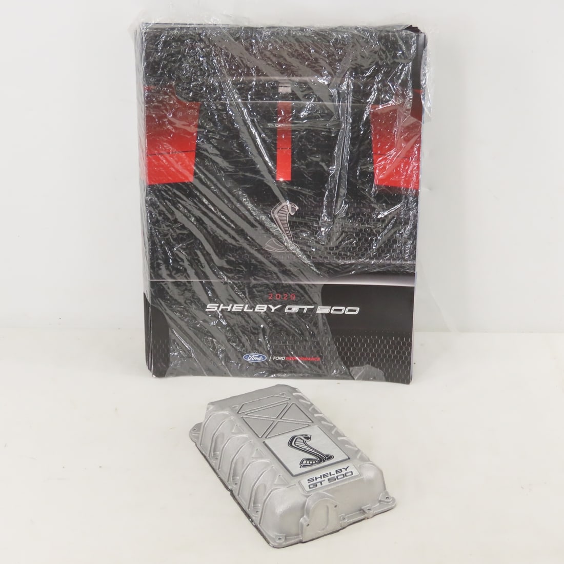 50 Shelby GT 500 2020 Brochures & Paperweight: 50 Shelby GT 500 2020 Brochures & Paperweight - dealer brochures in open wrapping & metal paper weight. LOT SIZE: 12x9x4", 8.5 LBS All information and photos are intended to be as accurate as
