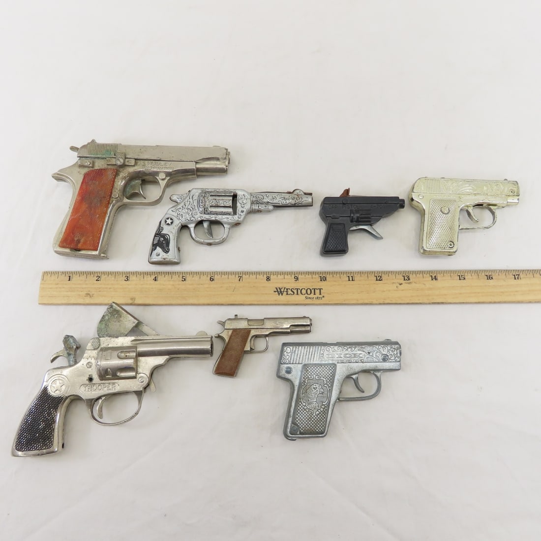 6 Vintage Cap Pistols & 1 Clicker Pistol - 16