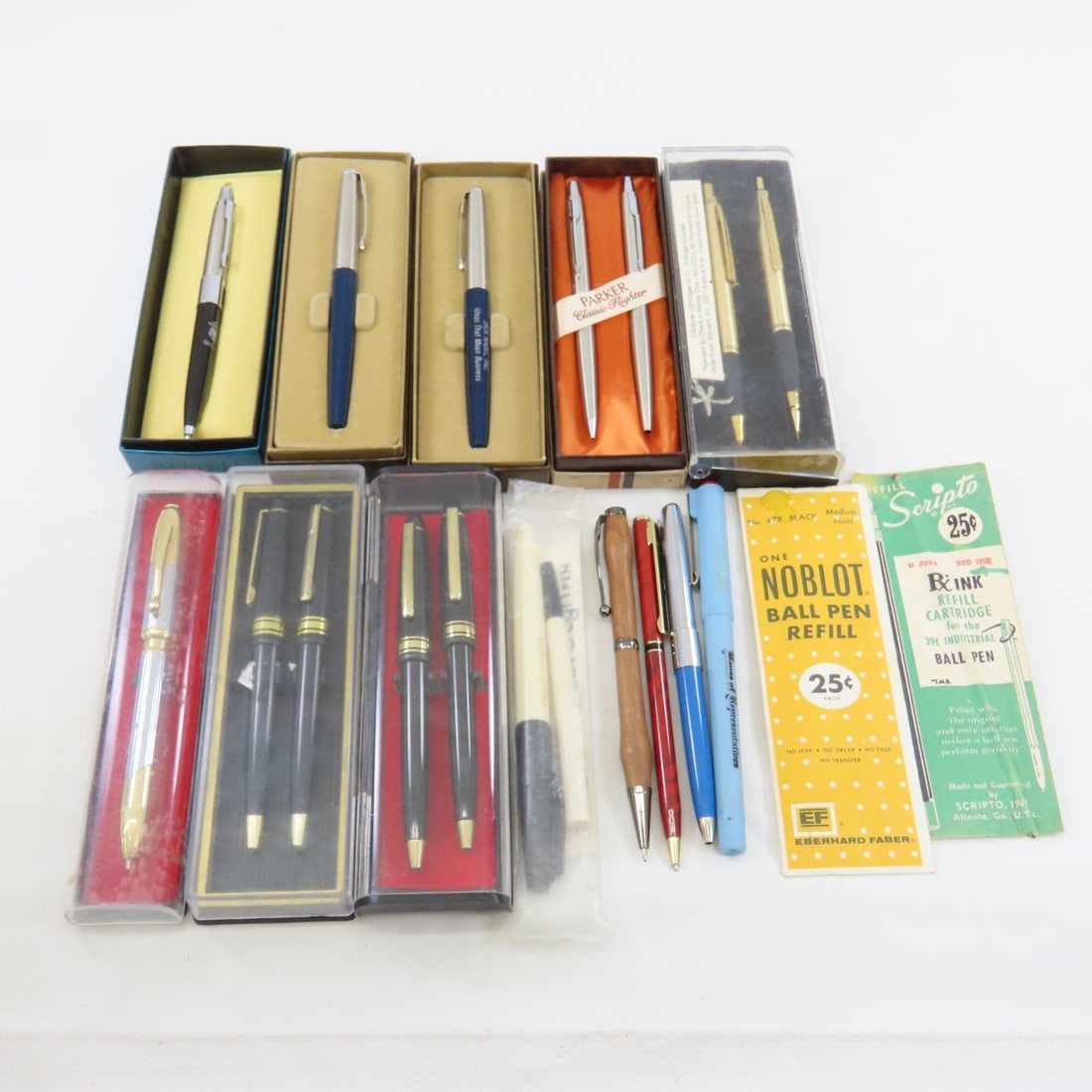 Parker Ball Point, and Other Pens and Sets: Parker Ball Point, and Other Pens and Sets - pen/pencil set in box, 2 with calendars- 1 Parker & 1 Sheaffer, Gripper set in plastic box, 2 sets nad1 single from Taiwan in plastic cases, Lodis twist