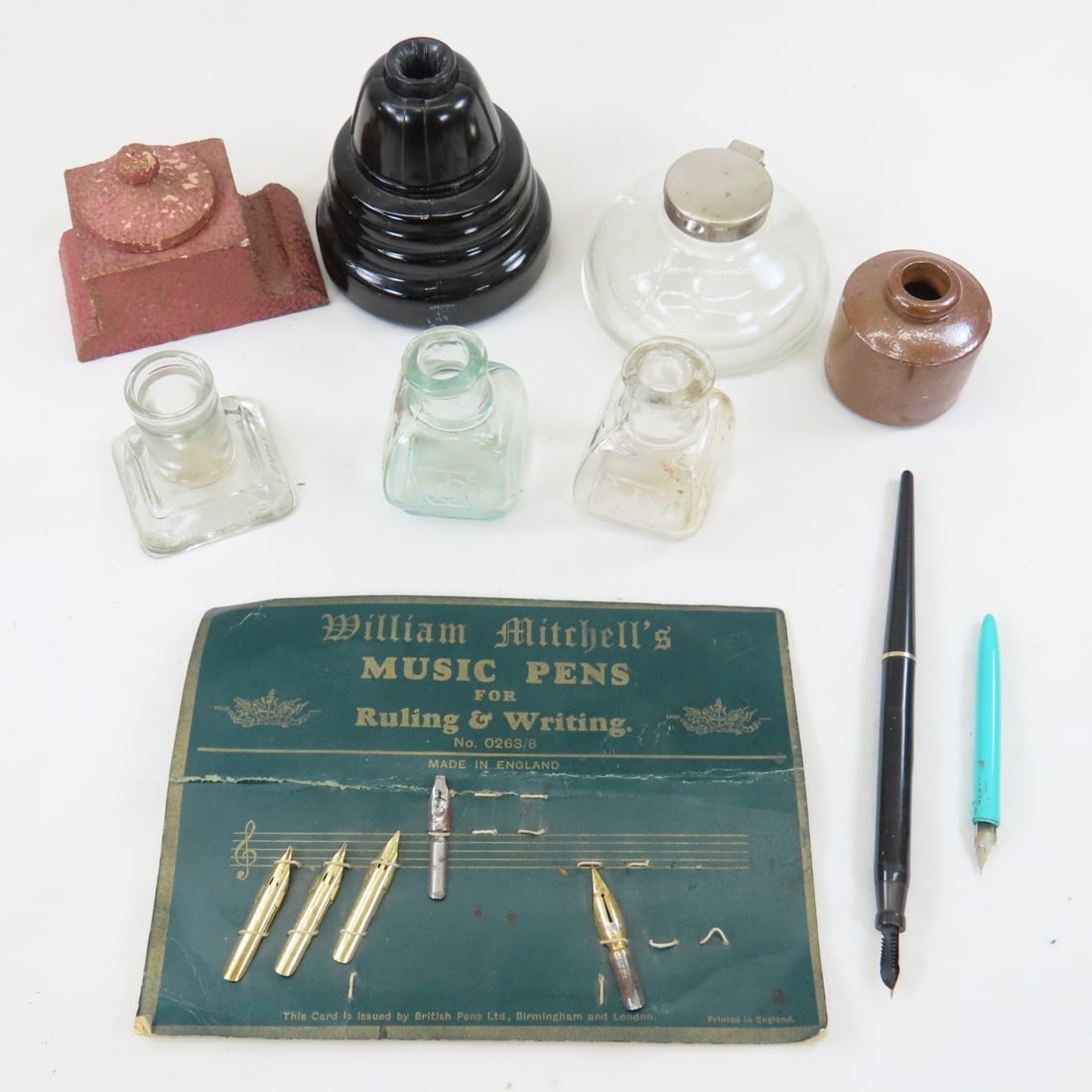 Ink Bottles, Ink Wells, Nibs & Pens: Ink Bottles, Ink Wells, Nibs & Pens - 2 JCB glass bottle, Sanford's ink bottle, TY Paris glass ink well with hinged lid, American Zephyr black glass ink well, unbranded stoneware ink well, LOT SIZE: 1