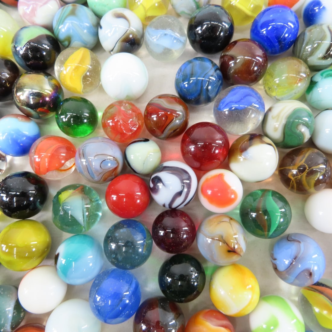 11 Pounds of Modern Machine Made Shooter Marbles - 17