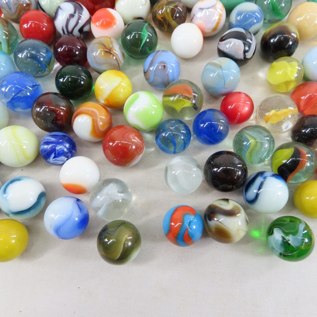 11 Pounds of Modern Machine Made Shooter Marbles - 20