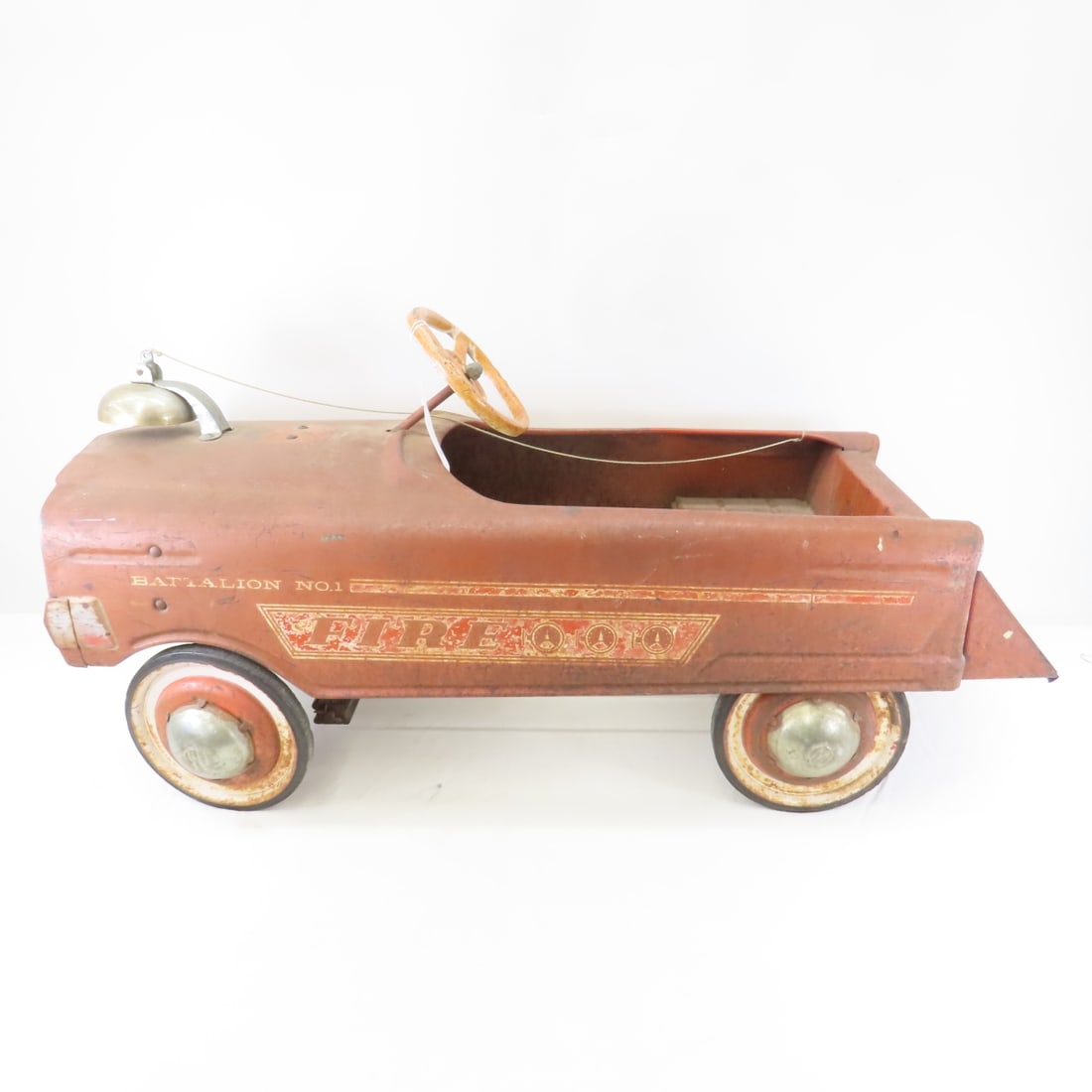 Battalion No 1 Pedal Fire Truck with Bell: Battalion No 1 Pedal Fire Truck with Bell - LOT SIZE: 36x17x15", 24 LBS All information and photos are intended to be as accurate as possible, but errors are possible. No item may be returned or