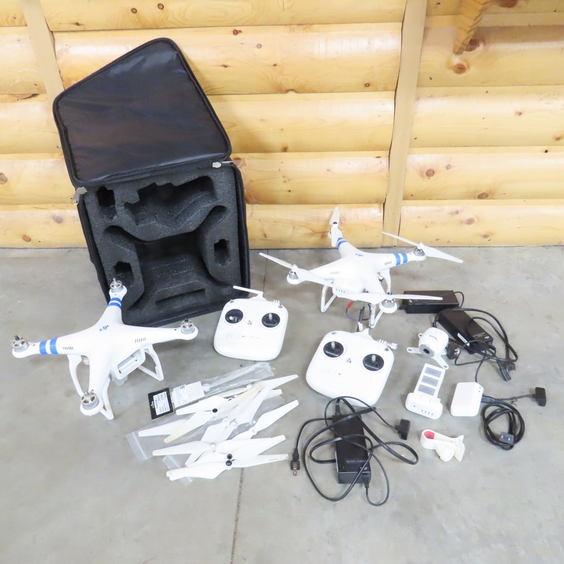 DJI Model PV330 & PV331 Drones, Remotes & More: DJI Model PV330 & PV331 Drones, Remotes & More - Untested: 2 Drones, Batteries, Cameras, Chargers, 1 Soft Case. Lot Size: 21 x 18 x 15", 14 lbs All information and photos are intended to be as