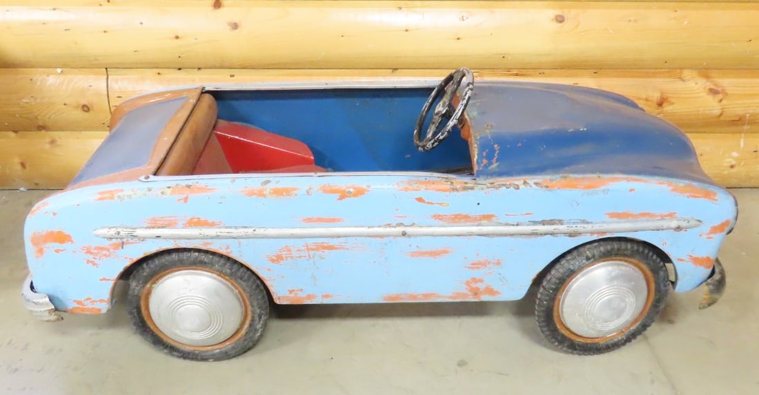 Vintage Children's Steel Pedal Car: Vintage Children's Steel Pedal Car - Possibly Murray. 50" long, Seat is 12" wide. No Chain hooked up, Currently does not Steer or Move when Pedaled. Lot Size: 50 x 20 x 18", 50 lbs- This is oversize