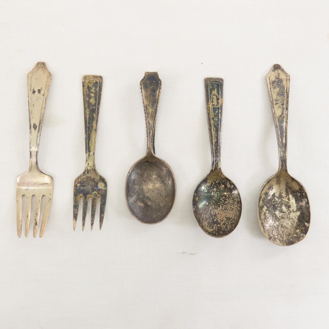 2 International Sterling Child's Sets & Spoon: 2 International Sterling Child's Sets & Spoon - Both Sets are marked International Sterling- one set is engraved RAL, spoon is marked Sterling and the logo for Webster CO. total weight is 2.6 Ounces .