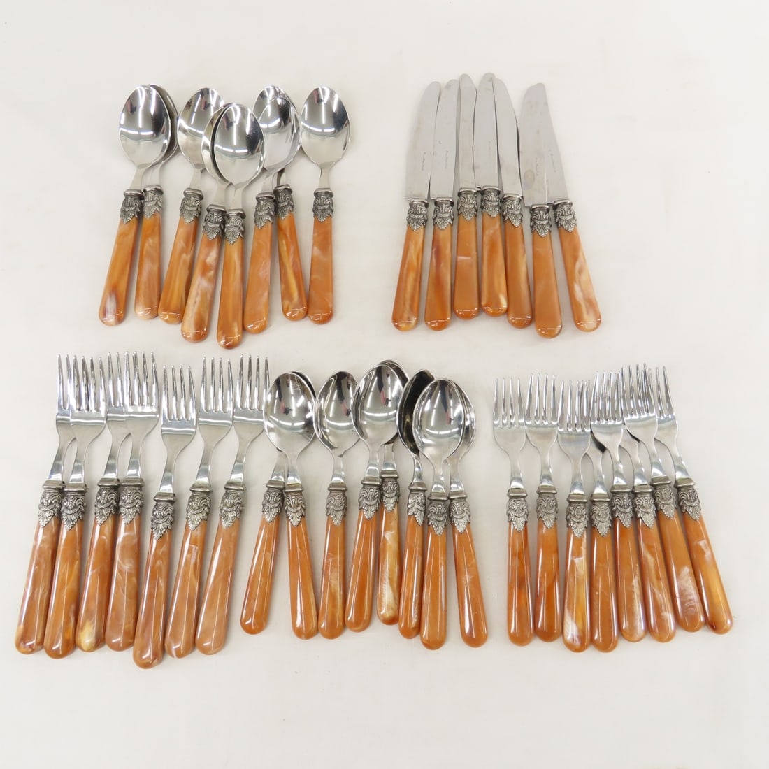 Italian EME Napoleon Acrylic Flatware Set: Italian EME Napoleon Acrylic Flatware Set - 8 teaspoons, 8 tablespoons, 8 salad forks, 7 dinner forks & 7 knives. LOT SIZE: 10x6x7", 4 LBS All information and photos are intended to be as accurate as