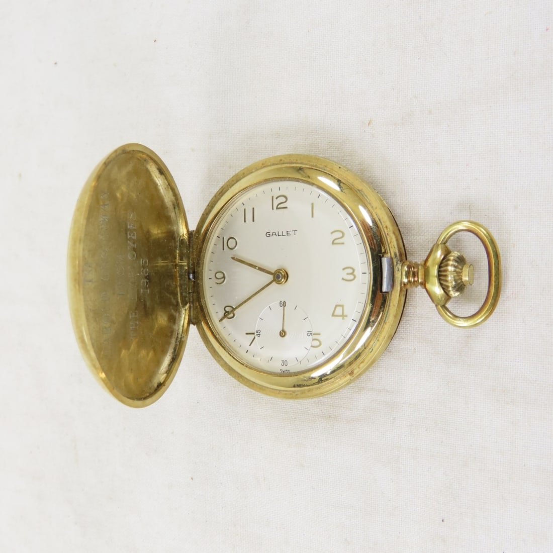 Gallet Racine Gold Plated Hunter Case Pocket Watch: Gallet Racine Gold Plated Hunter Case Pocket Watch - 17 jewel, working, 1965 engraving. LOT SIZE: 3x3x1", 1 LB All information and photos are intended to be as accurate as possible, but errors are pos