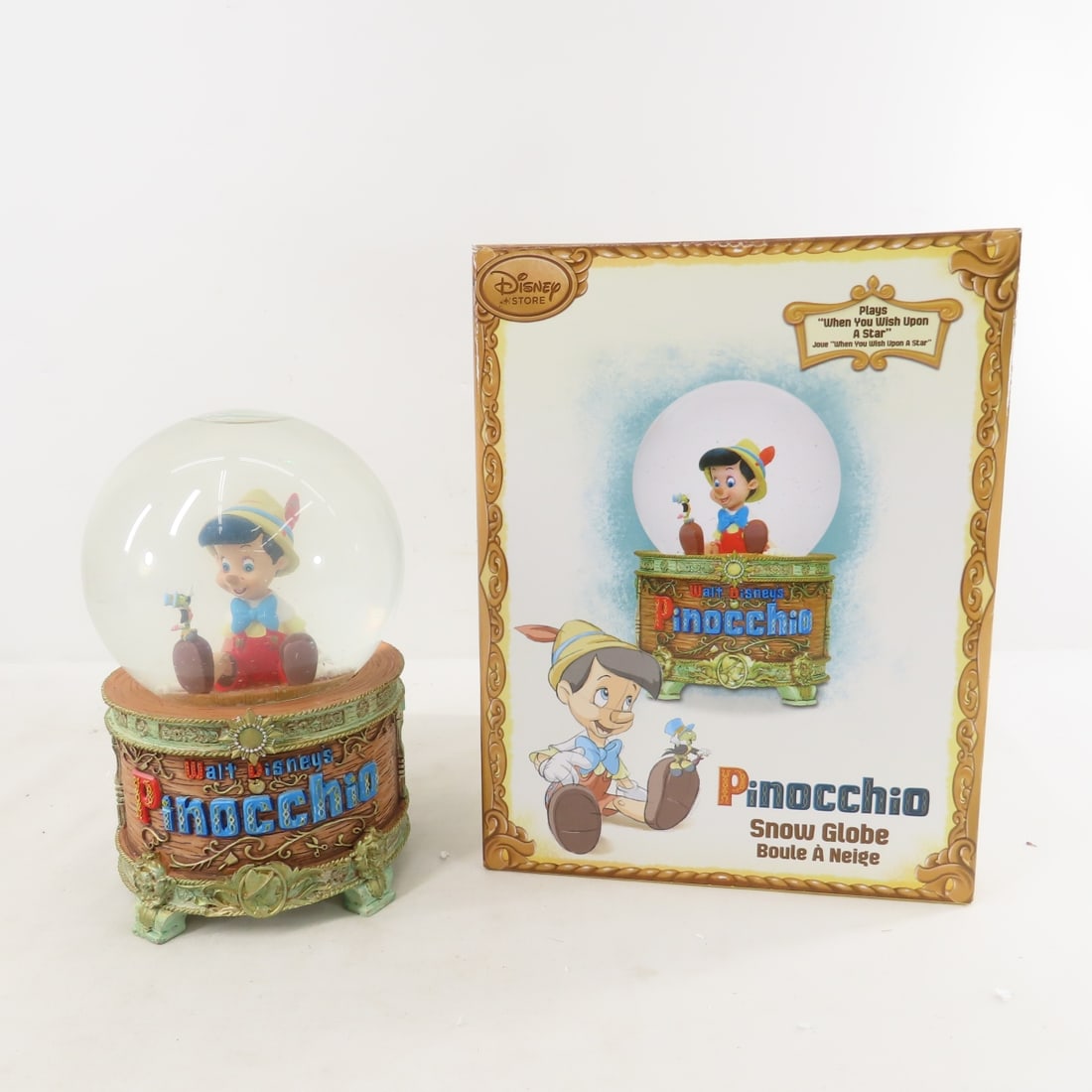 Disney Alice Tea Cup & Pinocchio Snow Globes - 2