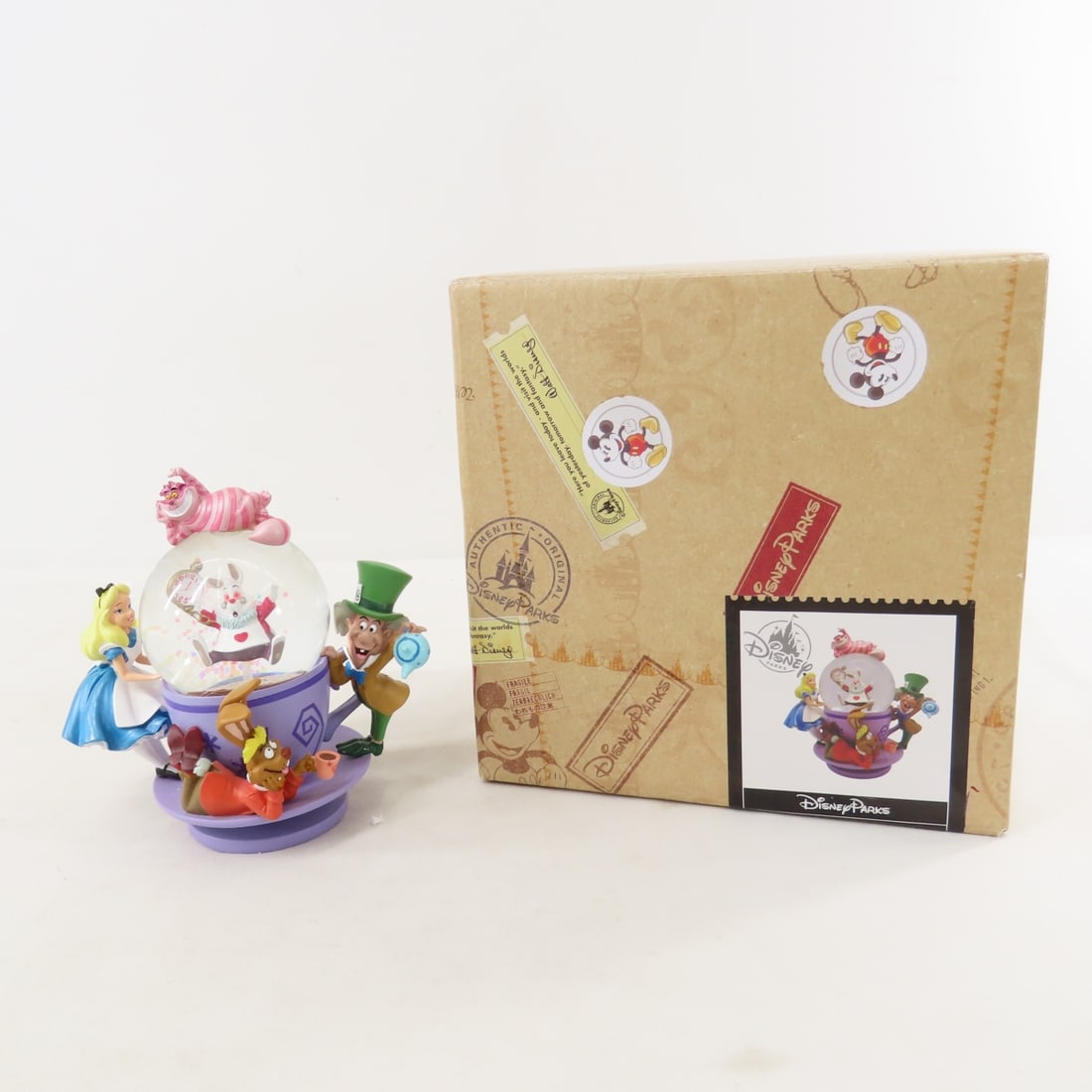 Disney Alice Tea Cup & Pinocchio Snow Globes - 8