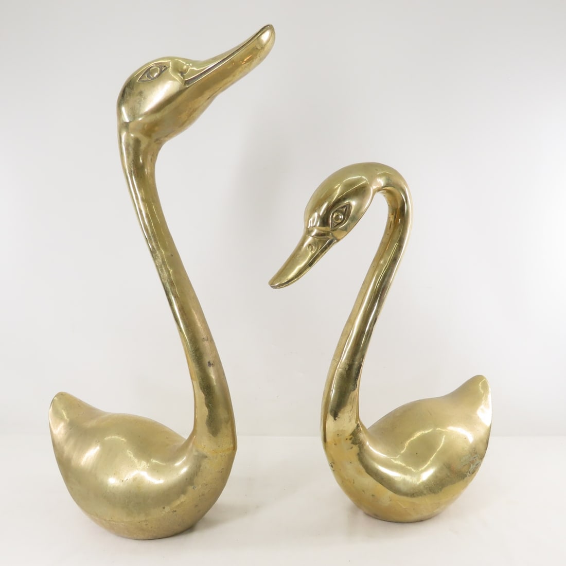 Pair of Mid Century Brass Swans- Tallest is 26.5" - 2