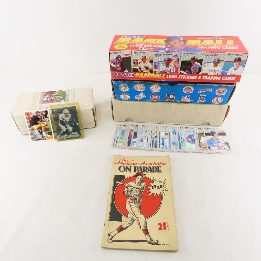 1980's Baseball & Football Cards with 1936 Book: 1980's Baseball & Football Cards with 1936 Book - 1936 The American Association on Parade book. 1991 Upper Deck football with Brett Favre rookie, 1985 & 1989 Donruss baseball & puzzle cards (both are