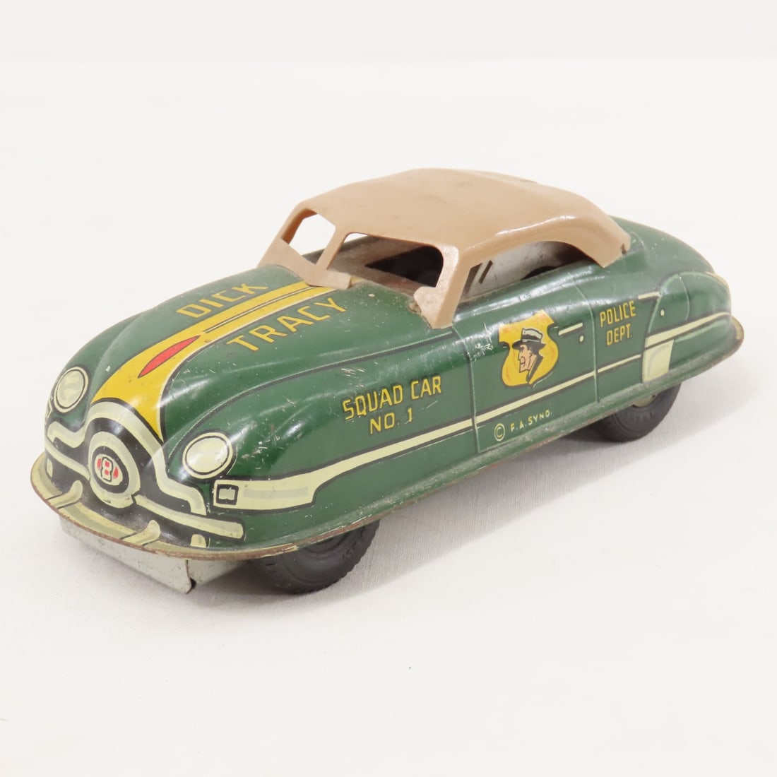 MARX Dick Tracy Tin Litho Friction Squad Car No 1: MARX Dick Tracy Tin Litho Friction Squad Car No 1 - works. LOT SIZE: 7x3x2" 1 LB All information and photos are intended to be as accurate as possible, but errors are possible. No item may be returned