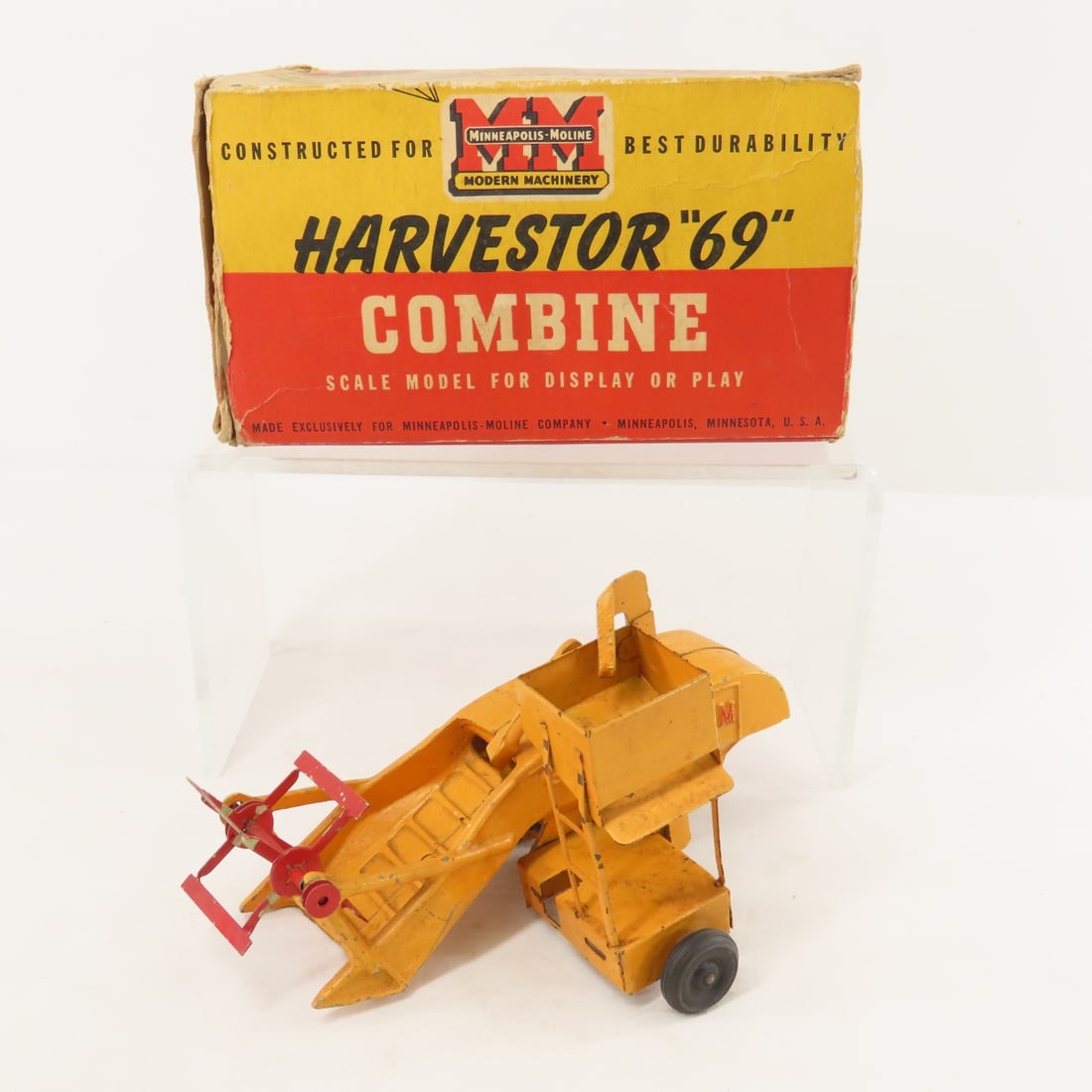 Minneapolis- Moline Harvestor "69" Combine 9831: Minneapolis- Moline Harvestor "69" Combine 9831 - with original box, both box and model are incomplete, made by SLIK, rubber tires. LOT SIZE: 8x5x5", 1 LB All information and photos are intended to