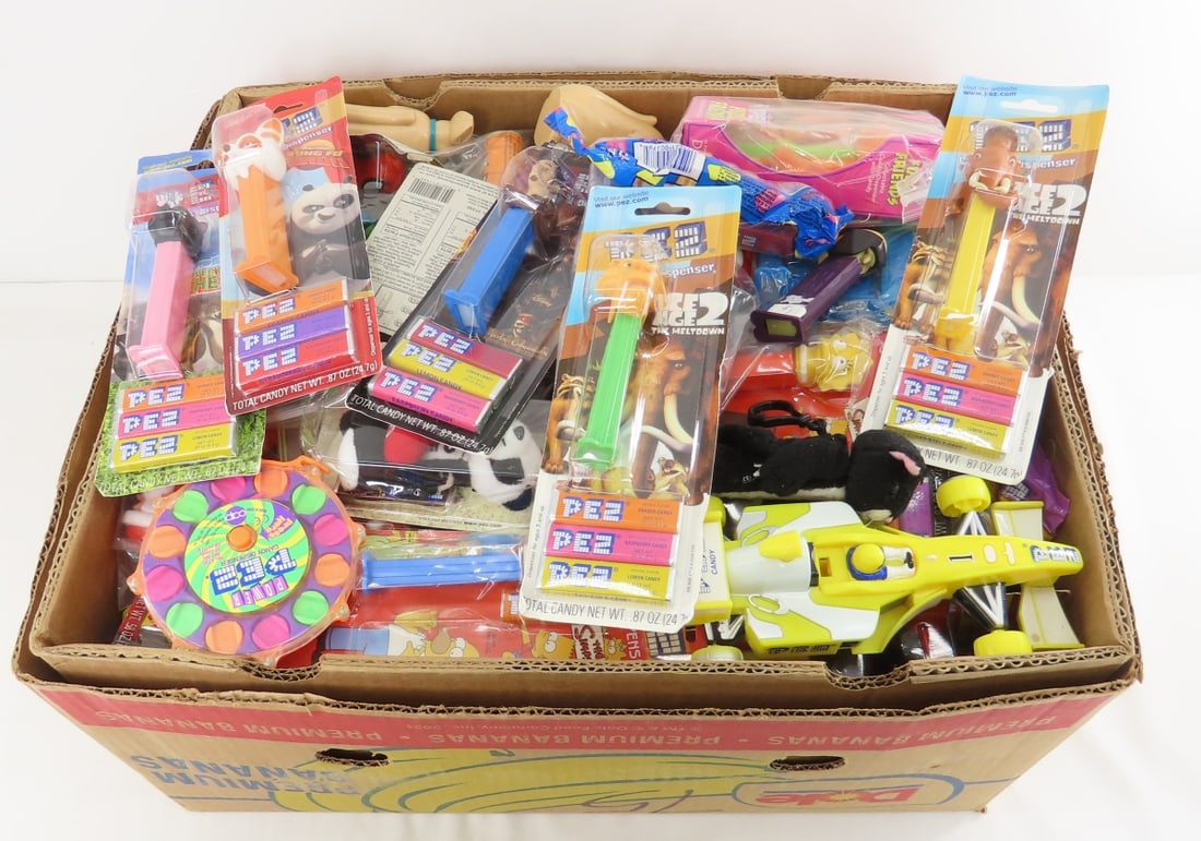 150 Mostly Sealed PEZ Dispensers- TMNT & others: 150 Mostly Sealed PEZ Dispensers- TMNT & others - Most are Sealed in Bags or Blister Packs. Simpson's, Ninja Turtle's, Easter, Clowns, Cartoons and more. Lot Size: 18x15x10", 16 lbs All information