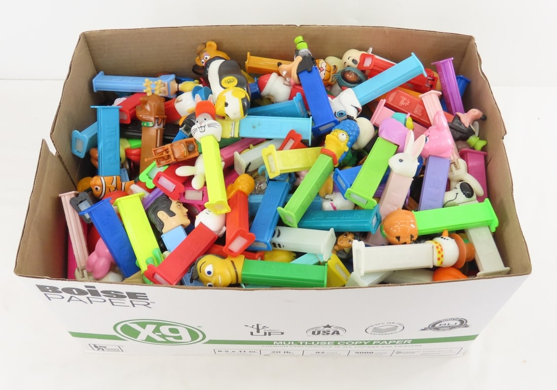 300 Loose PEZ Dispensers- Simpson's, Disney, Other: 300 Loose PEZ Dispensers- Simpson's, Disney, Other - Simpson's, Cartoon Characters, Disney, Santa and more. Lot Size: 17x11x9", 14 lbs All information and photos are intended to be as accurate as poss