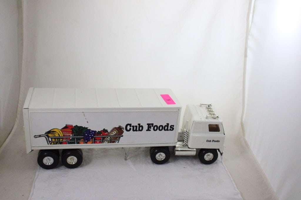 Ertl Cub Foods Metal Semi Tractor Trailer: Ertl Cub Foods Metal Semi Tractor Trailer - 24" x 8" x 5". 5 Lbs. All information and photos are intended to be as accurate as possible, but errors are possible. No item may be returned or r