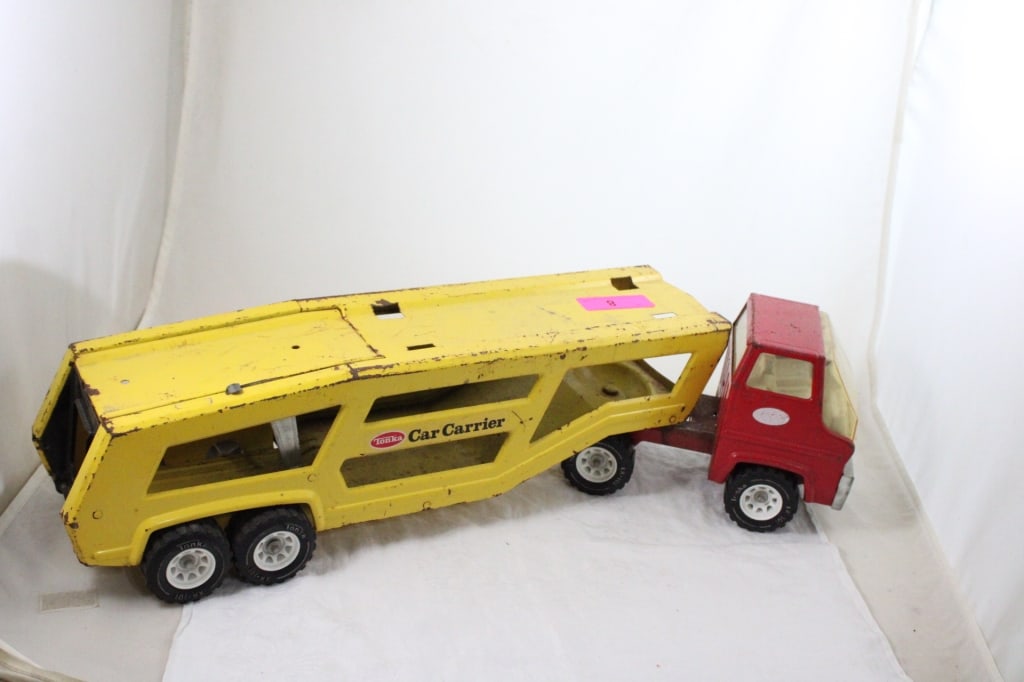 Tonka Pressed Steel Car Transport Carrier: Tonka Pressed Steel Car Transport Carrier - 27" x 7" x 7". 7 Lbs. All information and photos are intended to be as accurate as possible, but errors are possible. No item may be returned or r