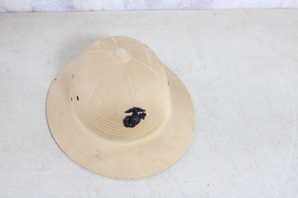 US Marine Pith Helmet: US Marine Pith Helmet - Lot Size 14 x 12" x 8". 1 Lb. All information and photos are intended to be as accurate as possible, but errors are possible. No item may be returned or refused