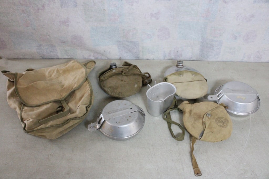 BSA Mess Kit, 2 Older Canteens, Rucksack, Cup: BSA Mess Kit, 2 Older Canteens, Rucksack, Cup - 3 Mess Kits (1 is Boy Scouts) Lot Size s14" x 12" x 10". 5 Lbs. All information and photos are intended to be as accurate as possible, but errors