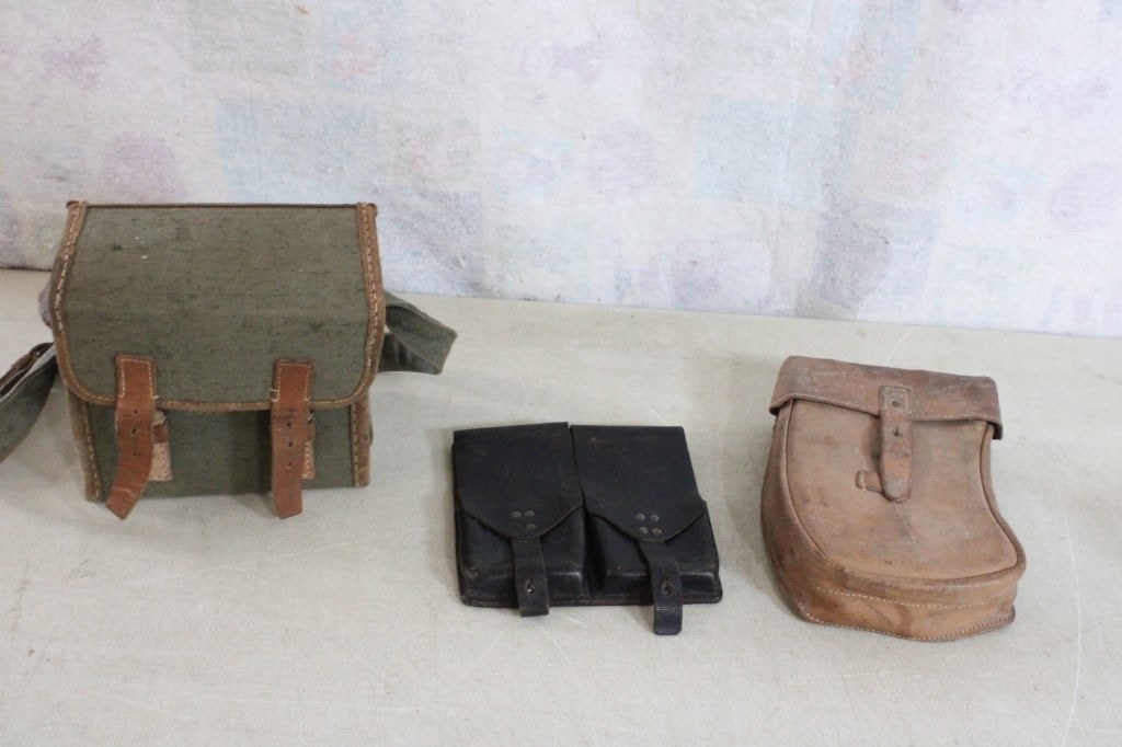 3 WW2 Military Ammunition Pouches: 3 WW2 Military Ammunition Pouches - 2 Czech. Military Ammo Pouches & 1 Russian Military Ammo Pouch. Lot Size 12" x 10" x 8". 3 Lbs. All information and photos are intended to be as accurate as