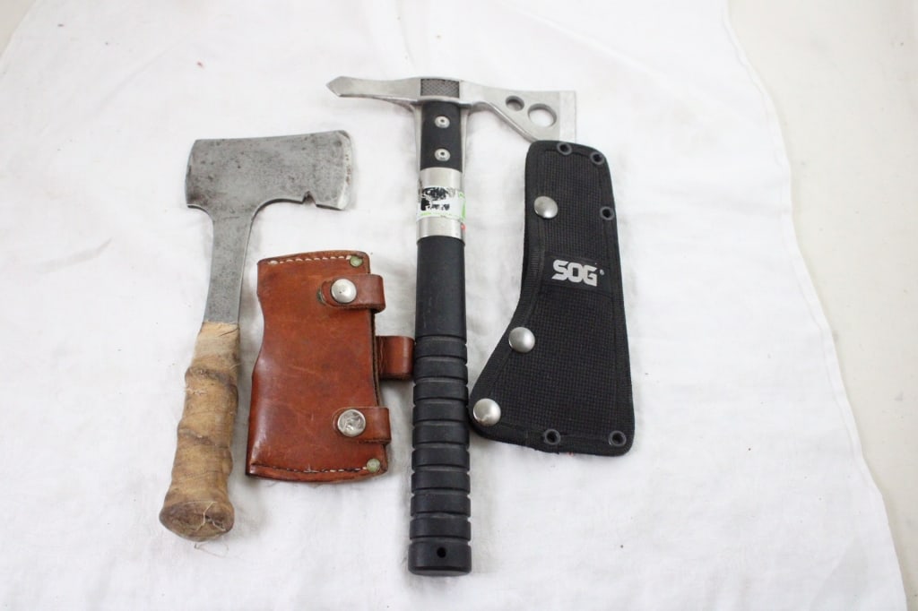 2 Hatchets- SOG and Unbranded: 2 Hatchets- SOG and Unbranded - Lot Size 14" x 8" x 4". 3 Lbs. All information and photos are intended to be as accurate as possible, but errors are possible. No item may be returned or