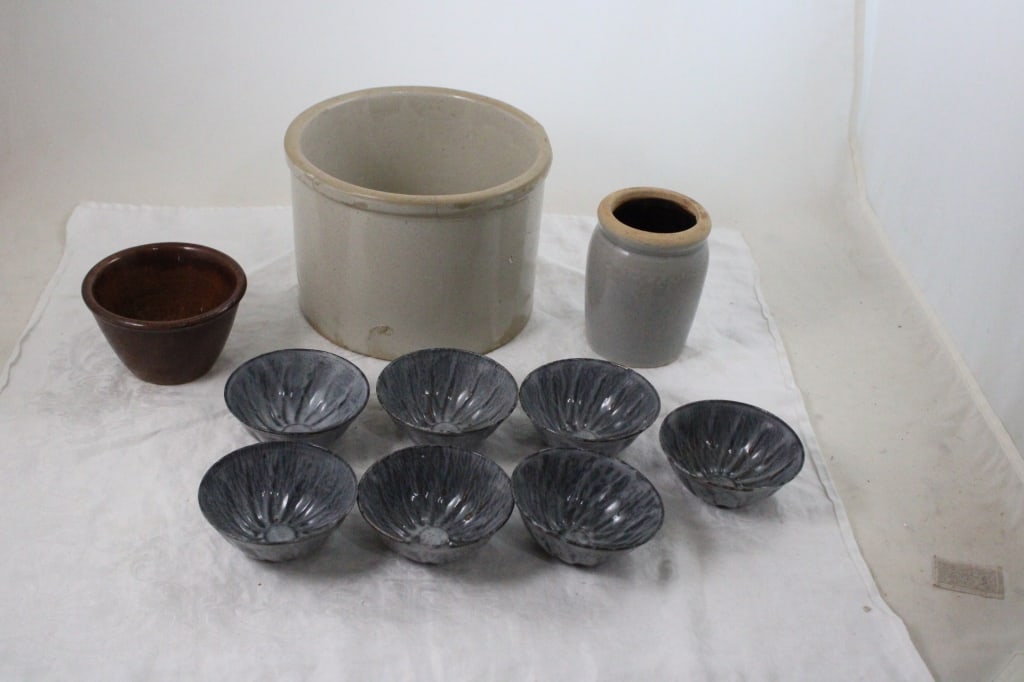 7 Graniteware Jell-o Molds, 3 Stoneware Pieces: 7 Graniteware Jell-o Molds, 3 Stoneware Pieces - Butter Crock, Vase, Custard Cup and 7 Graniteware Jello Molds. Lot Size 8" x 8" x 8". 6 Lbs. All information and photos are intended to be as