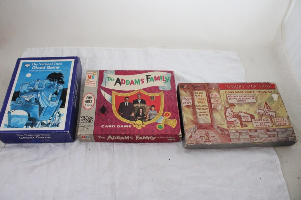 The Addams Family & 2 Other Vintage Games: The Addams Family & 2 Other Vintage Games - 1938 F.S. Co. Junior's Sign Shop, 1965 Addams Family Card Game & National Trust Ghost Game. Lot Size 9" x 7" x 4". 2 Lbs. All information and photos