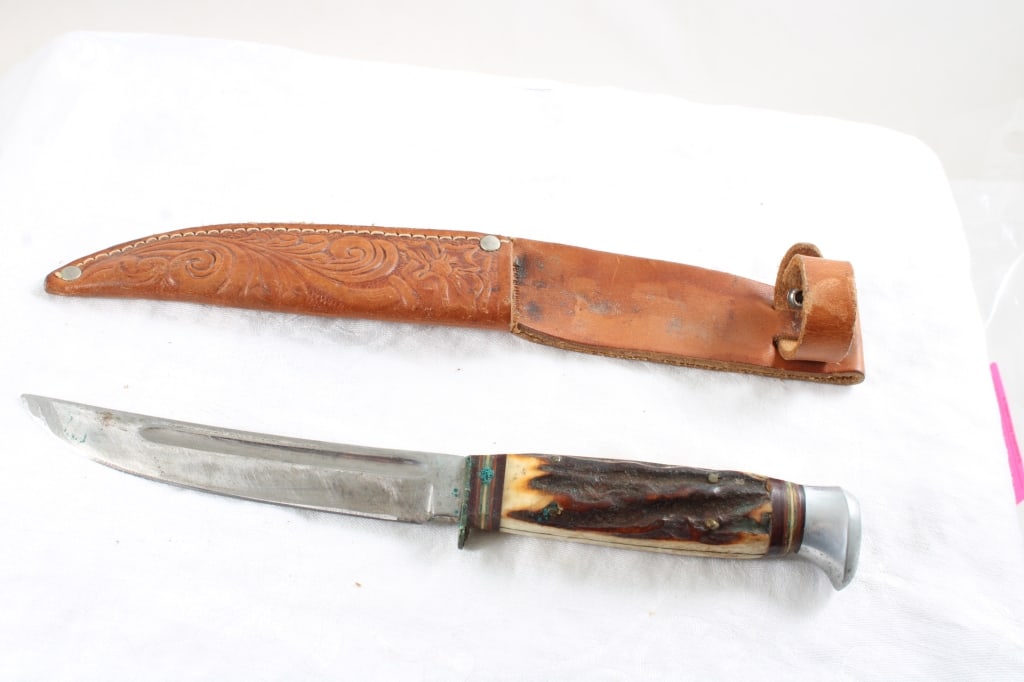 Krusius Fixed Blade Knife in Sheath: Krusius Fixed Blade Knife in Sheath - Lot Size 10" x 2" x 2". 1 Lb. All information and photos are intended to be as accurate as possible, but errors are possible. No item may be returned