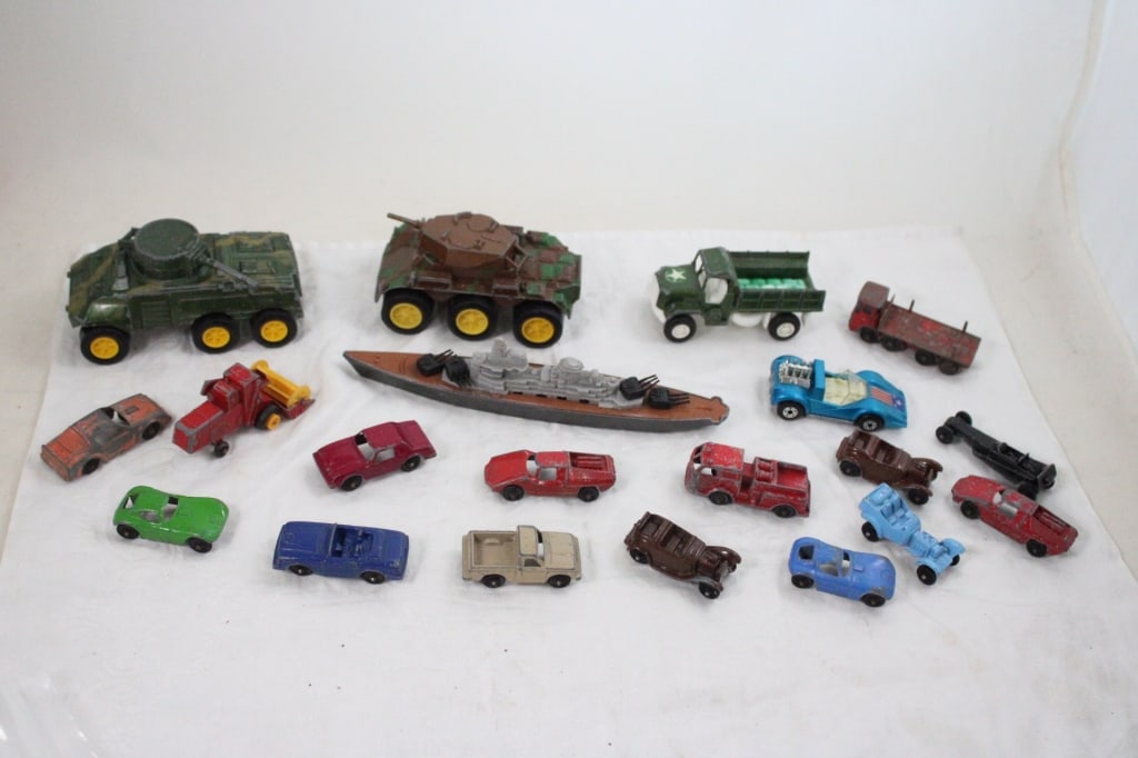 1970's Military Tootsie Toys Diecast Metal: 1970's Military Tootsie Toys Diecast Metal - 13 other Tootsietoy Cars. M-8 Armored Car, ARK Armored Tan Battleship #145, Deuce 1/2 Truck and 3 of the 13 are other brand cars. Lot Size 8" x 8" x 3". 2