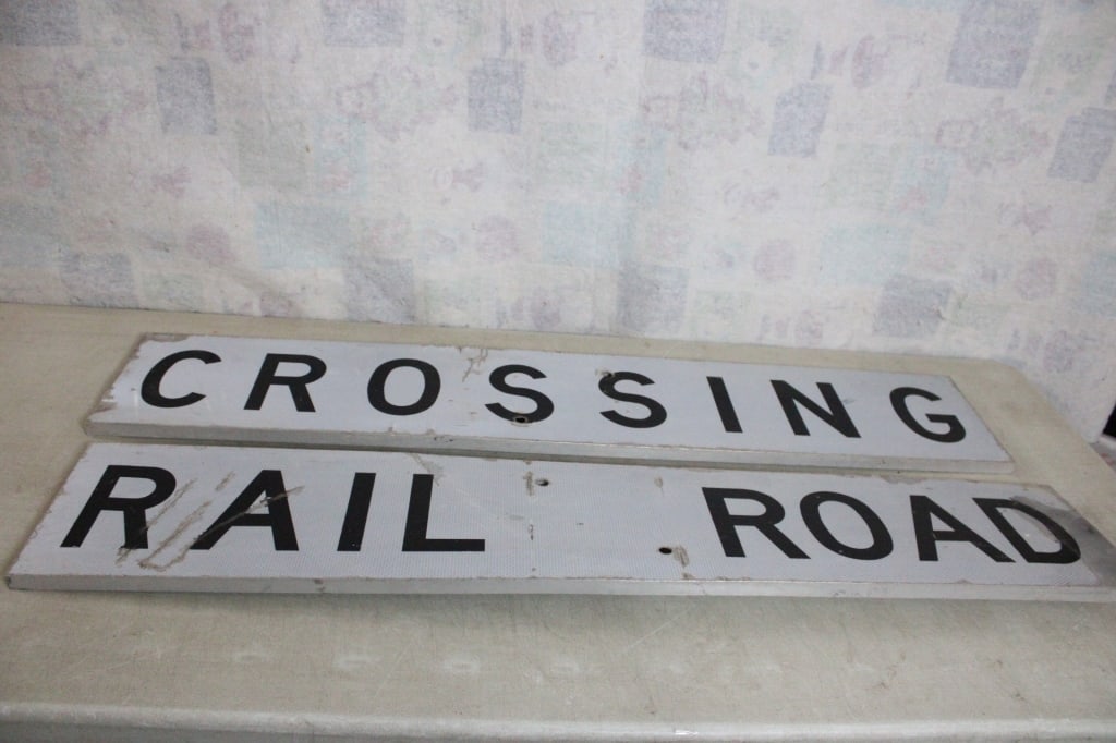 Railroad Crossing Reflective Metal Sign 48" x 9": Railroad Crossing Reflective Metal Sign 48" x 9" - Lot Size 48" x 9" x 2". 10 Lbs. All information and photos are intended to be as accurate as possible, but errors are possible. No item