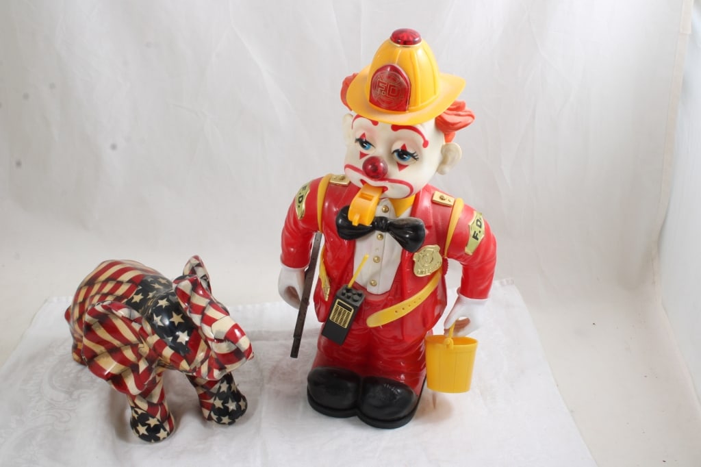 Bump'n Benny Clown, Patriotic Elephant Figure: Bump'n Benny Clown, Patriotic Elephant Figure - New Bright Bump 'n Benny Fireman Animated Clown 13" and Patriotic Elephant American Flag Figurine 9". Clown as is, missing works. Lot Size 13" x 10" x