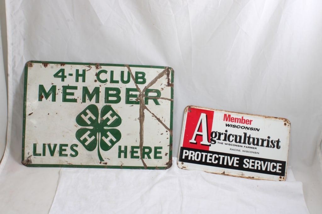 4-H Club Member & 2 Agriculturist Metal Signs: 4-H Club Member & 2 Agriculturist Metal Signs - 4-H Club Member Lives Here Metal Sign 13.5" x 9.5" (shows wear) and 2 Wisconsin Member Agriculturist Protective Service each measures 6" x 10". Lot