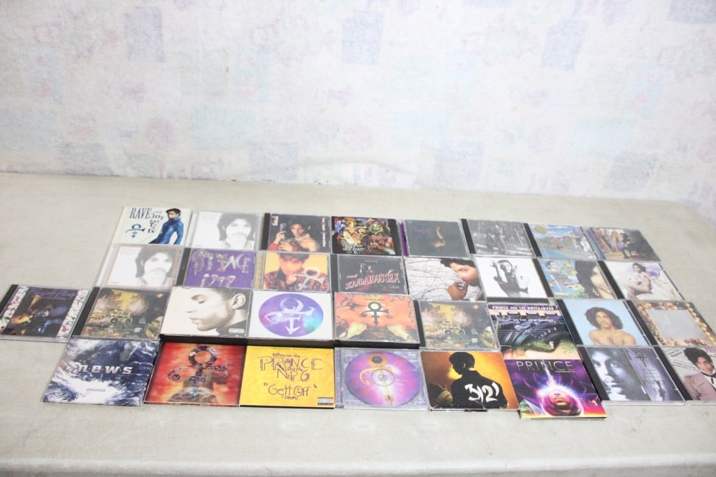 33 Prince CDs, Some are Multiple Sets: 33 Prince CDs, Some are Multiple Sets - One is a 4 CD Set of Crystal Ball 1998, and some other multiple CD Sets as well. Lot Size 14" x 8" x 6". 8 Lbs. All information and photos are intended to