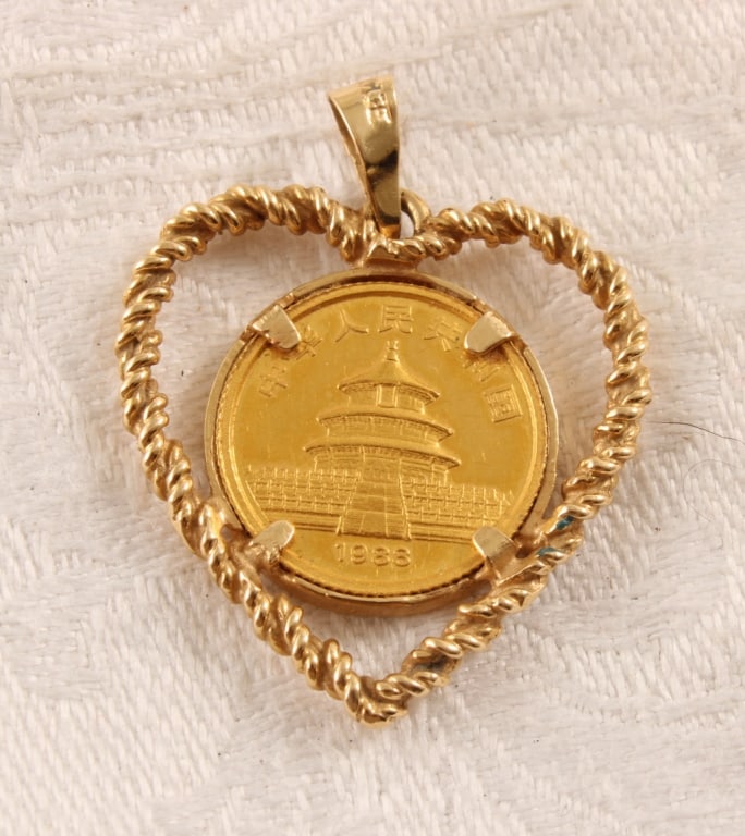 24k Gold 1988 Chinese Panda Coin,14k Gold Pendant: 24k Gold 1988 Chinese Panda Coin,14k Gold Pendant - Coin is .999 24k Gold and pendant is 14k Gold. Lot Size 3" x 3" x 1". .5 Lb. All information and photos are intended to be as accurate as
