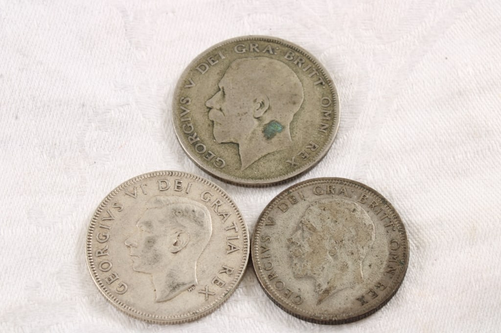3 Great Britain and Canadian Coins: 3 Great Britain and Canadian Coins - 1930 One Florin Great Britain Silver Coin, 1951 50 Cent Canadian Silver Coin, 1921 Great Britain Half Crown Silver Coin. Lot Size 3" x 3" x 1". .5 Lb. All