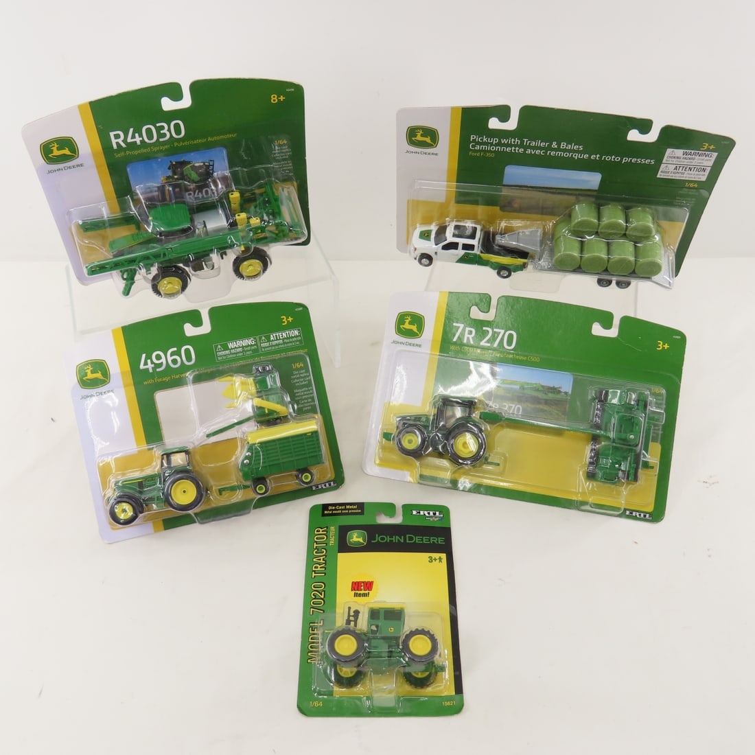 ERTL 1:64 Scale 4960 R4030 7020 F350 & more: ERTL 1:64 Scale 4960 R4030 7020 F350 & more - All NIP. Lot Size: 14x10x5", 3 lbs All information and photos are intended to be as accurate as possible, but errors are possible. No item may be