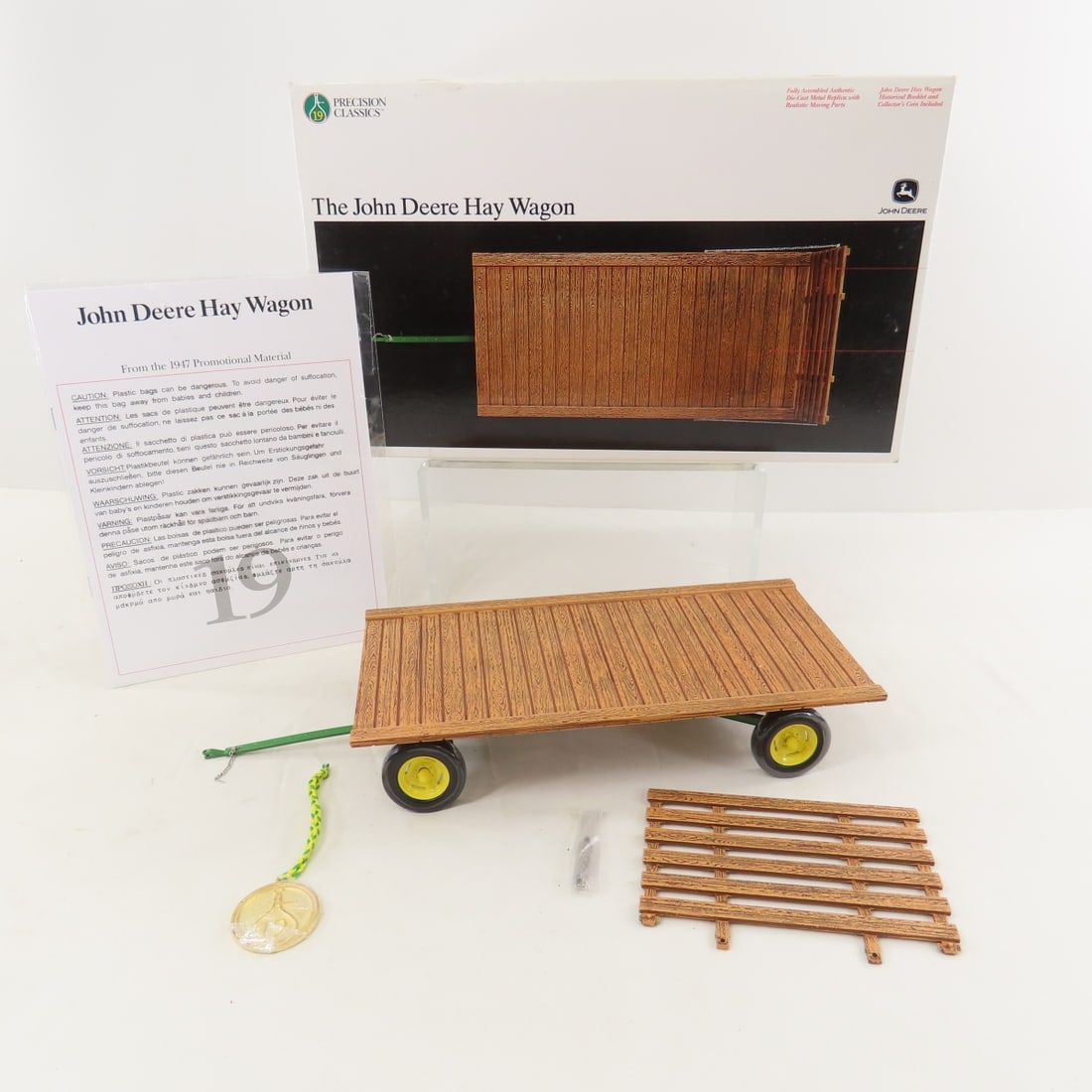 Precision Classic John Deere Hay Wagon in Box: Precision Classic John Deere Hay Wagon in Box - 1:16, LOT SIZE: 15x9x5", 3.5 LBS All information and photos are intended to be as accurate as possible, but errors are possible. No item may be