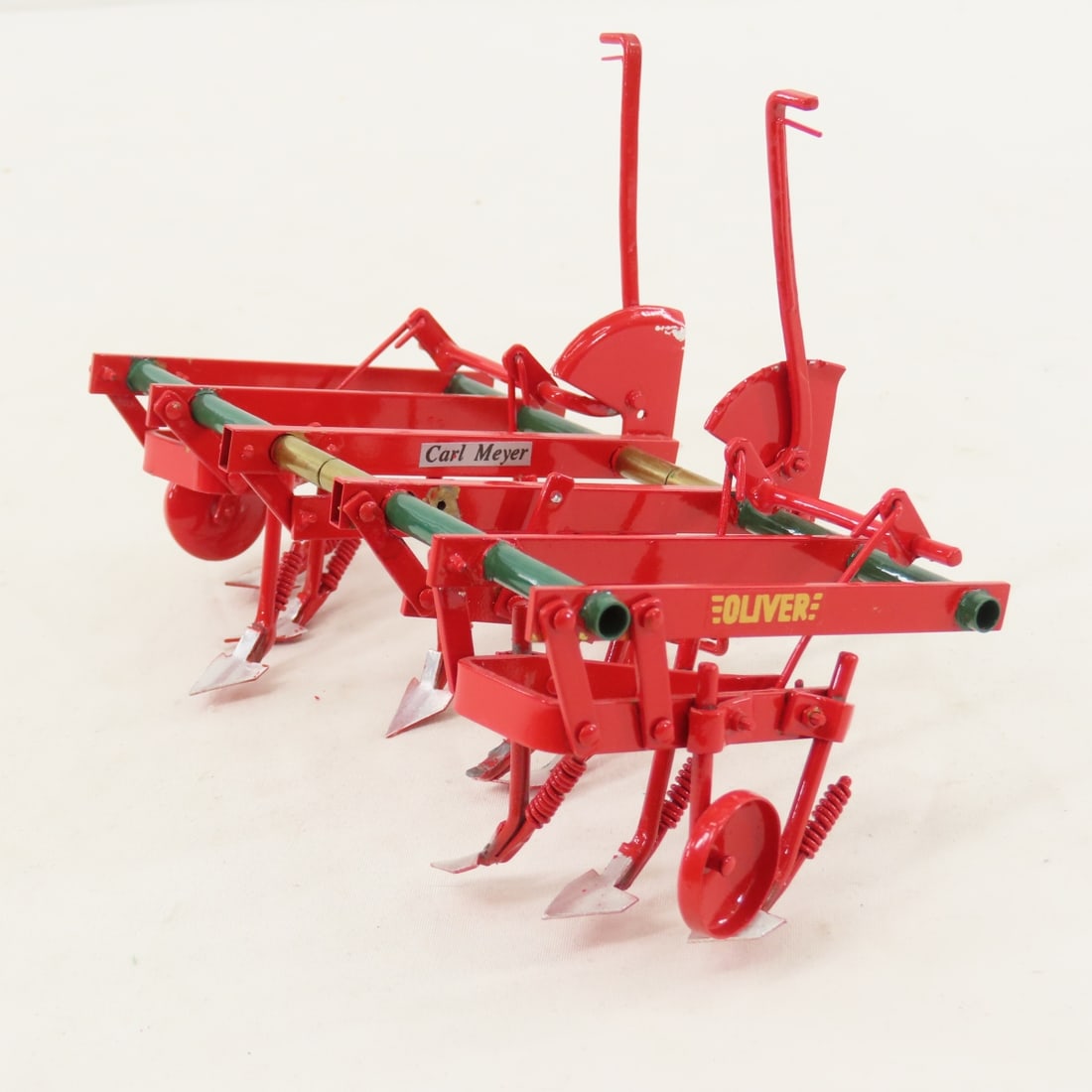 Scratch Built Oliver 2 Row Cultivator- Carl Meyer: Scratch Built Oliver 2 Row Cultivator- Carl Meyer - 1:16, missing 1 plow point, metal, LOT SIZE: 7x5x4", 1 LB All information and photos are intended to be as accurate as possible, but errors are
