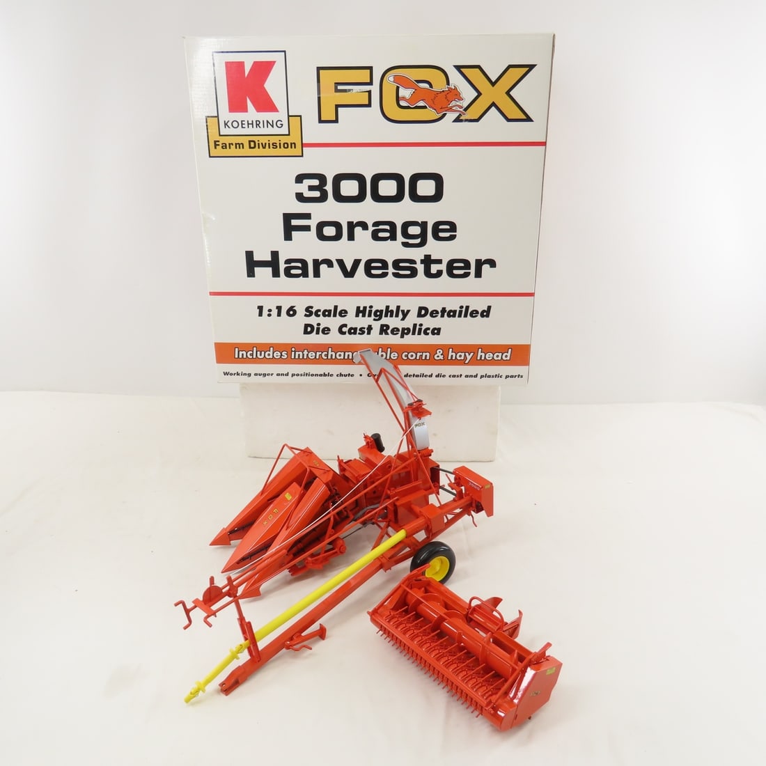 Koenig Fox Chopper 3000 Forage Harvester: Koenig Fox Chopper 3000 Forage Harvester - SpecCast 1:16 in box, with hay head, resin, rubber tires, LOT SIZE: 16x16x11", 5 LBS All information and photos are intended to be as accurate as possible,