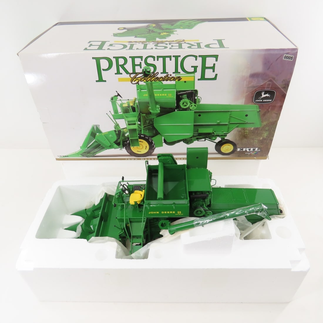 ERTL Britains 1:16 John Deere Prestige 55 Combine: ERTL Britains 1:16 John Deere Prestige 55 Combine - 1/16 Scale Diecast ERTL John Deere Prestige Collection 55 Combine in Box. Lot Size: 22x11x10", 10 lbs All information and photos are intended to be