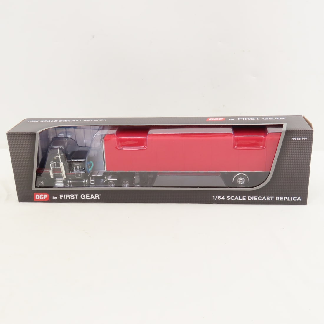 DCP First Gear 1:64 Scale Peterbilt 379 Sleeper: DCP First Gear 1:64 Scale Peterbilt 379 Sleeper - Black/Red 60-1612, 1/64 Scale Peterbilt 379 63" Flat Top Sleeper with Utility Roll Tarp Spread Axle Trailer. Lot Size: 16x4x3" 1 lb All information an