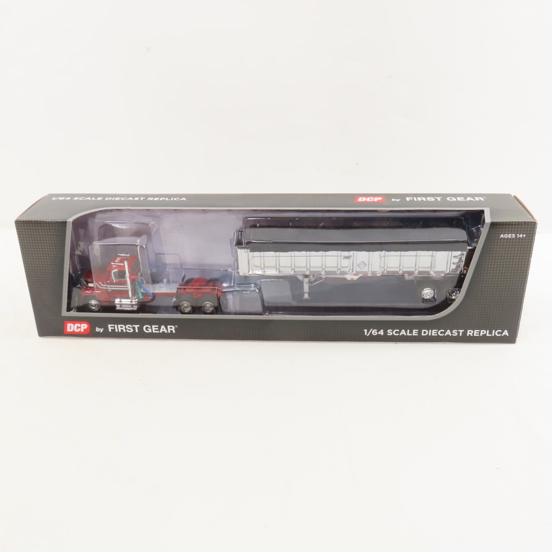 DCP First Gear 1:64 Scale Ford LTL-9000 Day Cab: DCP First Gear 1:64 Scale Ford LTL-9000 Day Cab - Red/Black 60-1799 1/64 Scale Ford LTL-9000 Day Cab with Eat End Dump Tandem Trailer. Lot Size: 16x4x3", 1 lb All information and photos are intended