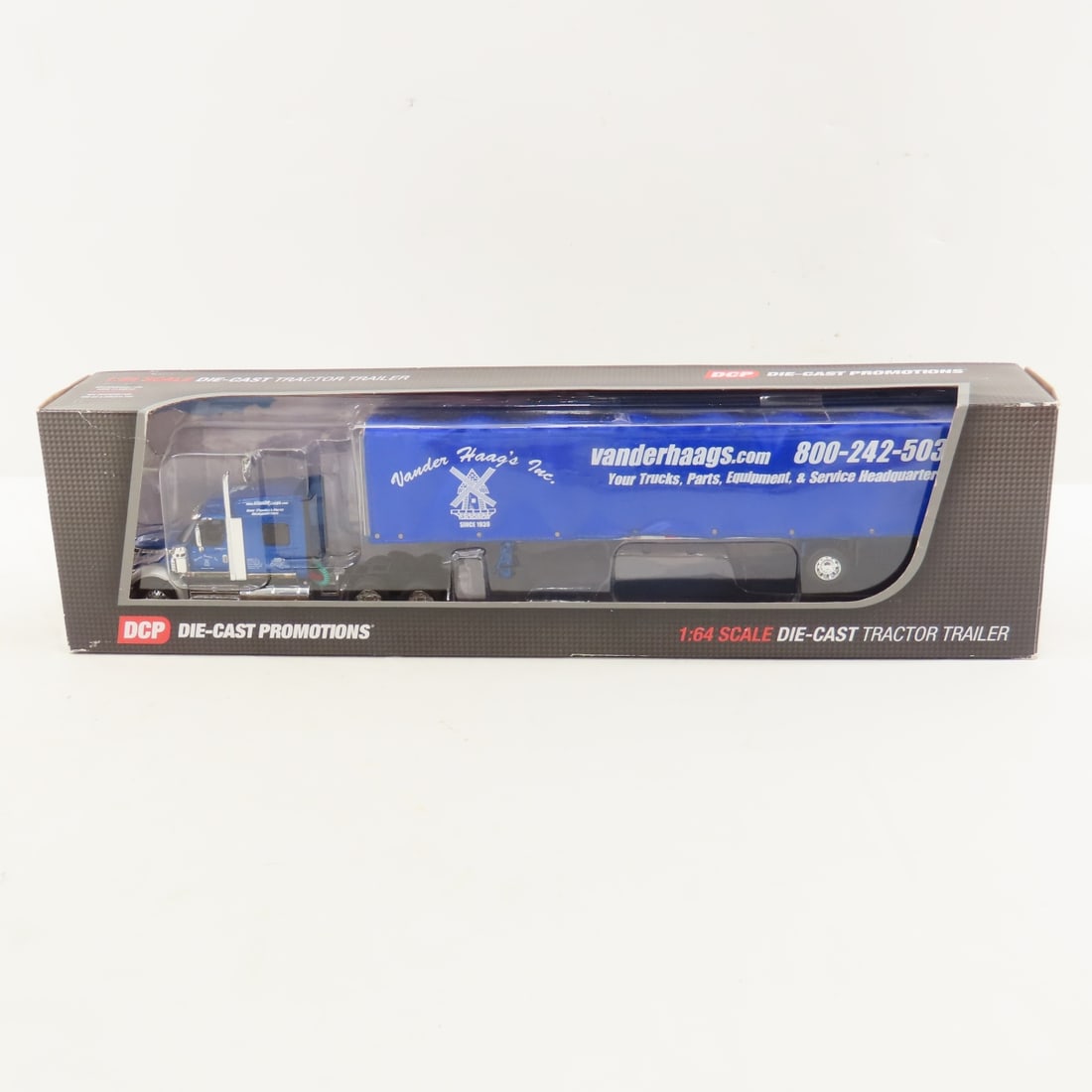 DCP First Gear 1:64 Scale Vander Haag's Lonestar: DCP First Gear 1:64 Scale Vander Haag's Lonestar - Vander Haag's Mid Roof Truck w/53' Utility Roll Tarp Spread Axle Trailer. Lot Size: 16x4x3" 1 lb All information and photos are intended to be as