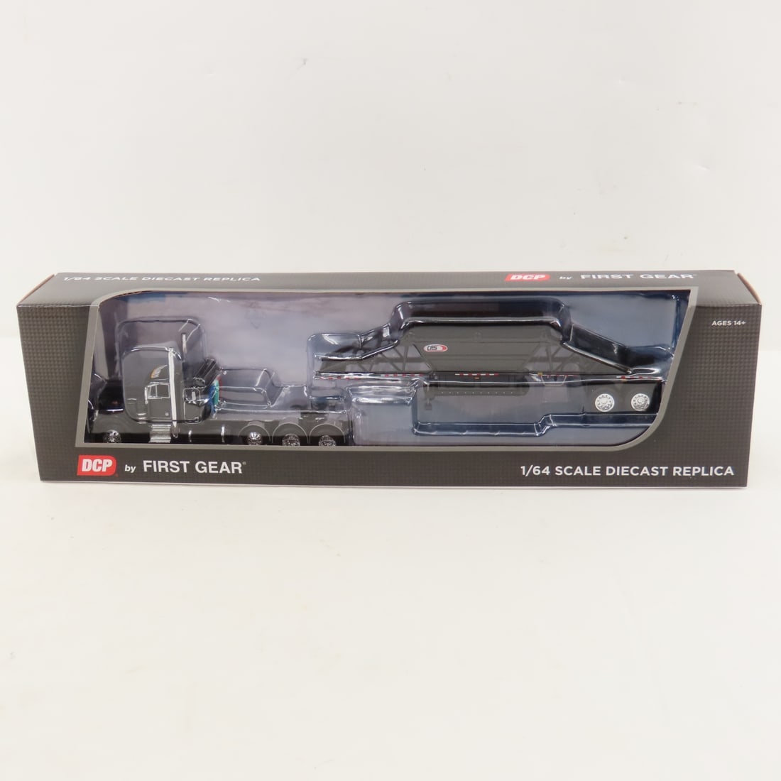 DCP First Gear 1:64 Scale Peterbilt 379 Flat Top: DCP First Gear 1:64 Scale Peterbilt 379 Flat Top - Black/Black 60-1614 1/64 Scale Peterbilt 379 36" Flat Top Sleeper with Manac Bottom Dump Trailer. Lot Size: 16x4x3" 1 lb All information and photos