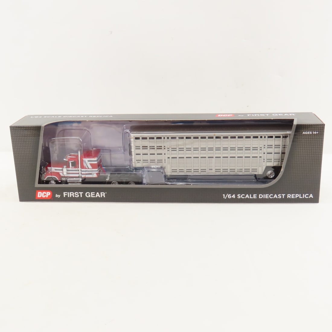 DCP First Gear 1:64 Scale Mack Super-Liner: DCP First Gear 1:64 Scale Mack Super-Liner - Red/White 1/64 Scale Mack Super-Liner 60" Flattop Sleeper & Wilson 45' Vintage Livestock Trailer. Lot Size: 16x4x3" 1 lb All information and photos are